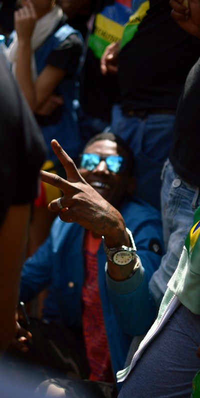 Mauritian people celebrating with flag